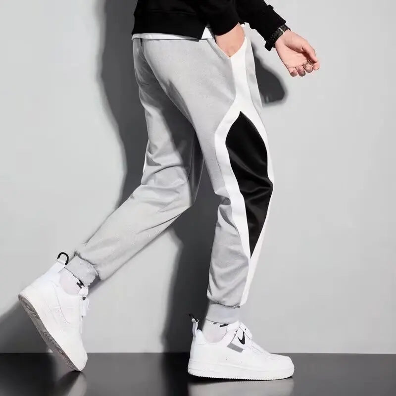 Casual sports long pants for men, spring and summer sweatpants, loose regular workwear pants, leg tied pants, Korean version tre